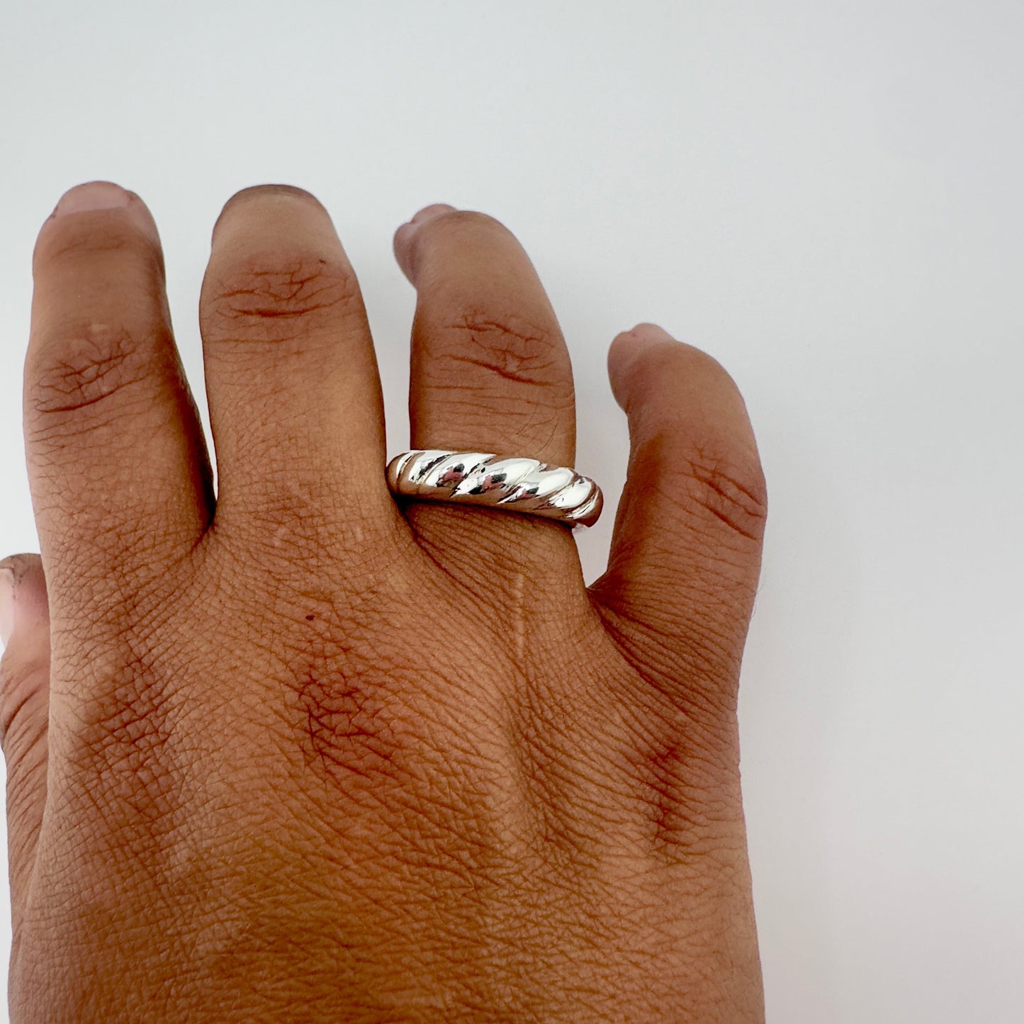 Tiral Wave ring on a hand
